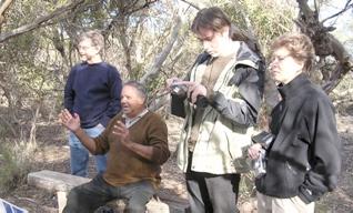 An example of �Reconciliation Tourism� � Neville Gollan of Camp Coorong (seated in center) leading a small group of tourists in Coorong National Park, South Australia.